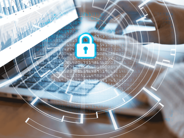 Cybersecurity data protection concept with lock icon overlay on laptop. IT Total Care provides managed IT services and cybersecurity solutions for small to mid-sized businesses in the San Francisco Bay Area.