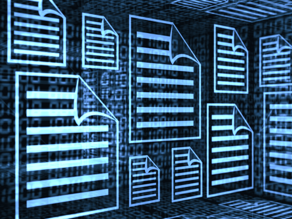 Employee using a Microsoft Surface laptop in a modern office as part of a Microsoft Cloud migration and digital workspace setup.