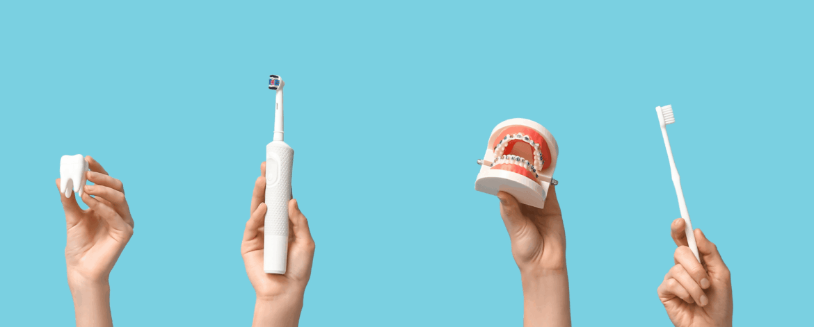 Dental care tools including tooth model braces electric toothbrush and manual toothbrush representing modern dental technology supported by secure IT systems
