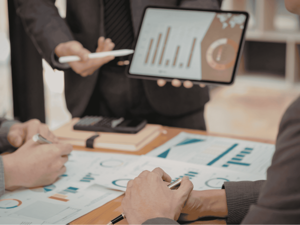 IT leadership conducting a technology business review to evaluate risks, costs, and future planning