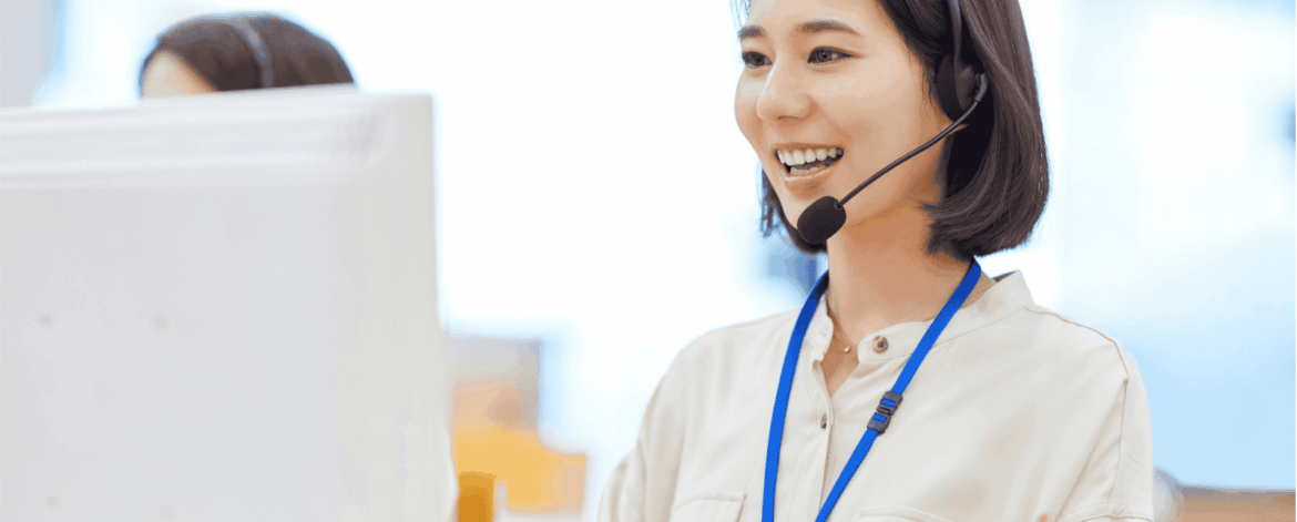 Business professionals collaborating with IT support staff to evaluate when to upgrade from family IT support to a managed service provider.