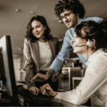 Customer support professionals using headsets in an office environment, representing professional MSP support replacing family IT assistance.