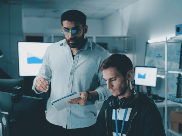 IT professionals monitoring cybersecurity systems and protecting sensitive healthcare data in a managed IT services environment