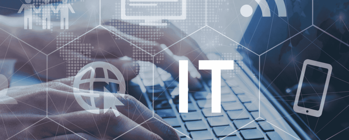 Close-up of hands typing on a laptop keyboard, overlaid with a semi-transparent hexagonal grid featuring a large “IT” label and icons for a globe with cursor, computer monitor, Wi-Fi, smartphone, user group, and data chart against a faint world-map background.