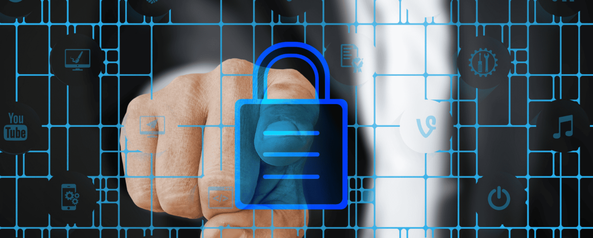 Employee working remotely on laptop with cybersecurity lock screen overlay. IT Total Care provides managed IT support, data security, and endpoint protection for small to mid-sized businesses in the San Francisco Bay Area.