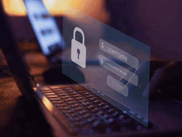 Cybersecurity login protection with lock icon and username password field on laptop. IT Total Care offers managed IT services and secure technology solutions for small to mid-sized businesses in the San Francisco Bay Area.