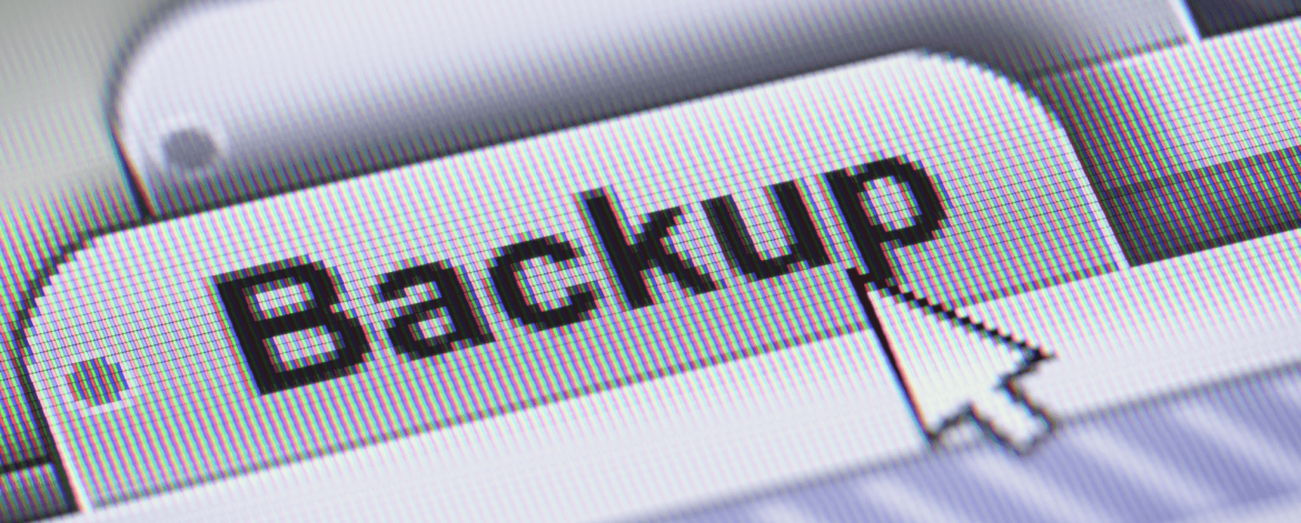 IT technician managing server rack for critical data backups. IT Total Care delivers managed IT services, data protection, and backup solutions for Bay Area SMBs.