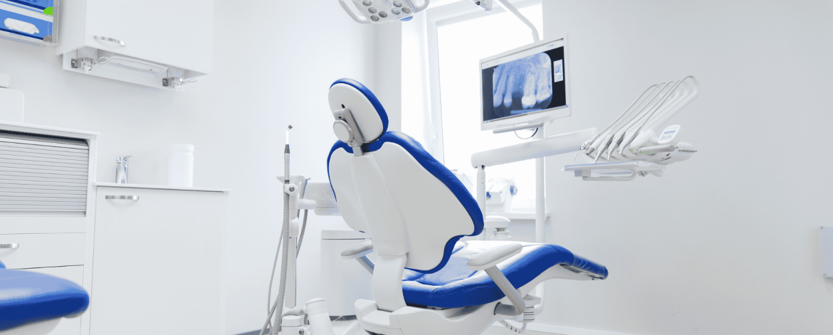 Dental operatory with digital X-ray monitor – reliable Open Dental data protection and HIPAA-compliant IT support for small dental offices.