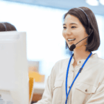 Business professionals collaborating with IT support staff to evaluate when to upgrade from family IT support to a managed service provider.