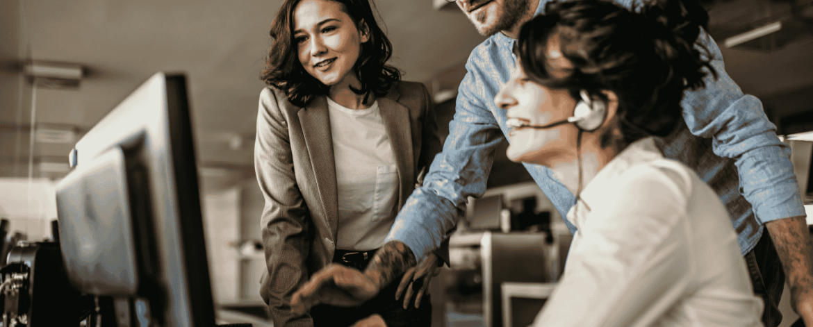 Customer support professionals using headsets in an office environment, representing professional MSP support replacing family IT assistance.