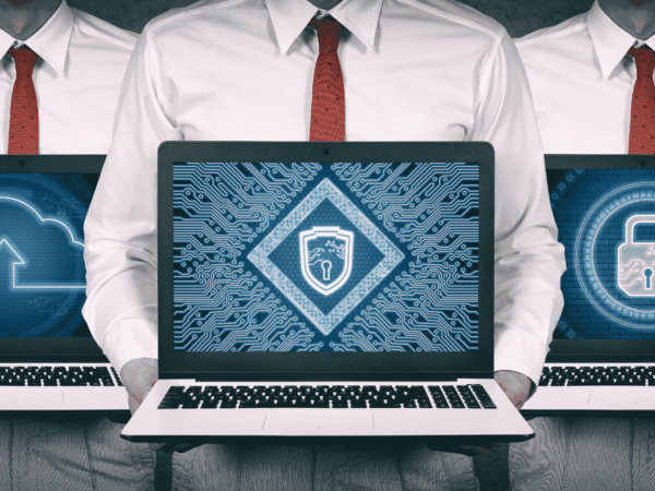 Laptop displaying cybersecurity shield and encryption graphics representing data protection and network security for healthcare organizations