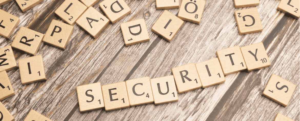 Scrabble tiles spelling security representing password management and cybersecurity awareness for home-based care organizations.