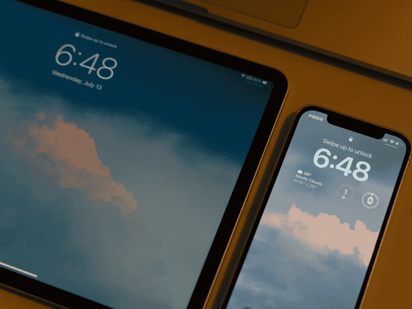How Home Based Care Companies Can Manage and Secure their Teams Mobile Devices 2 Tablet and smartphone displaying lock screens side by side, representing secure mobile device management and access controls for home-based care agencies.