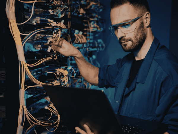 IT Hardware Procurement and Deployment for Home Based Care Agencies 2 Open laptop undergoing hardware inspection and setup, representing device procurement, configuration, and deployment processes for home-based care agencies