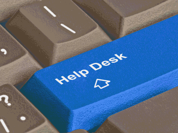 Image 2_9.2.26 Close-up of a blue Help Desk key on a computer keyboard, the support path staff use when they need to send ePHI by encrypted email.
